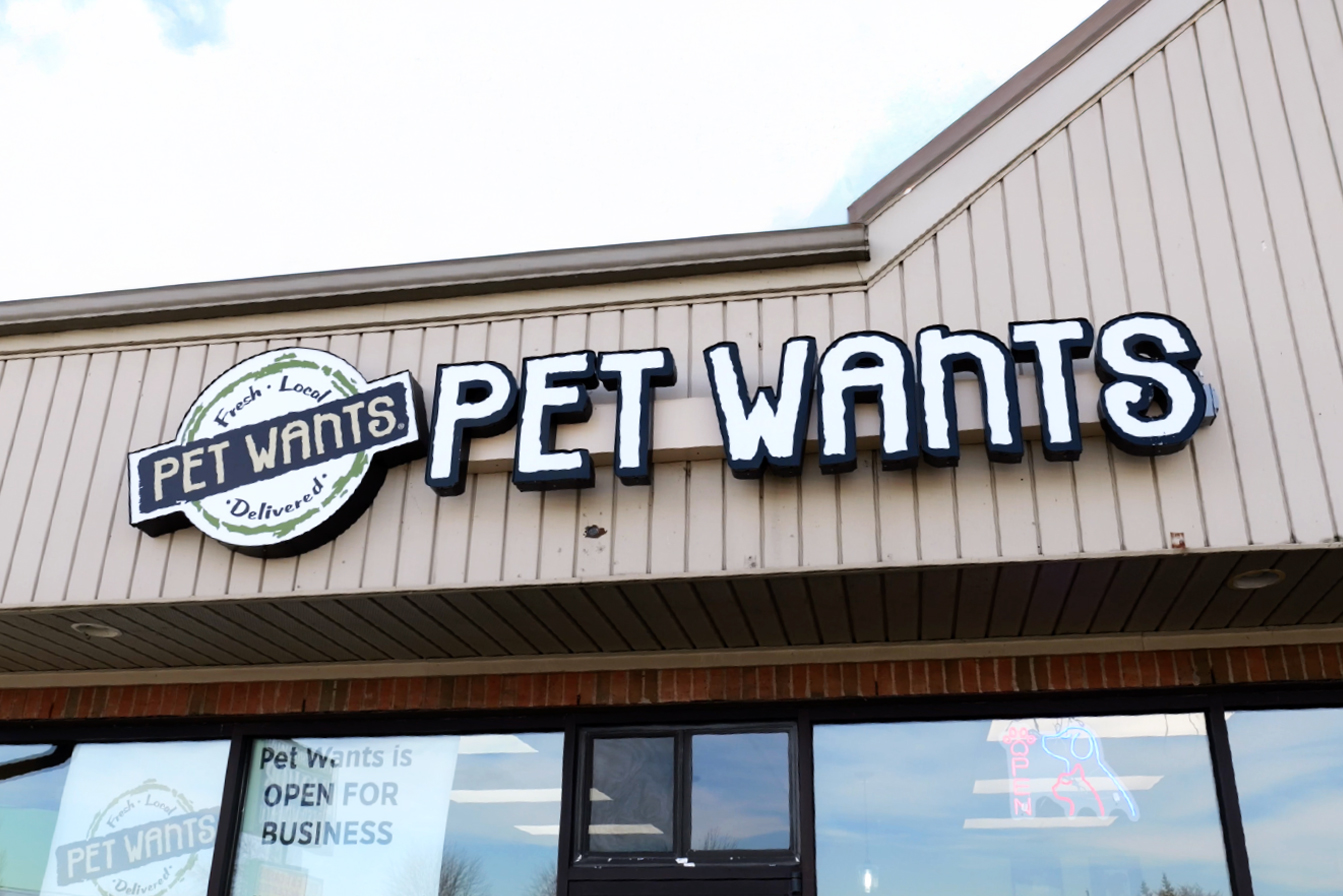 Pet Wants Chesterfield storefront featuring a custom channel letter sign installed by Phillips Sign & Lighting, enhancing visibility and brand identity.