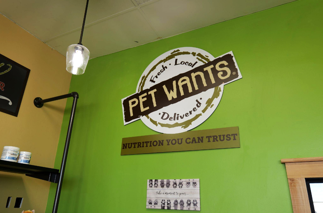 Pet Wants Chesterfield storefront with a custom channel letter sign installed by Phillips Sign & Lighting, enhancing visibility and brand presence.